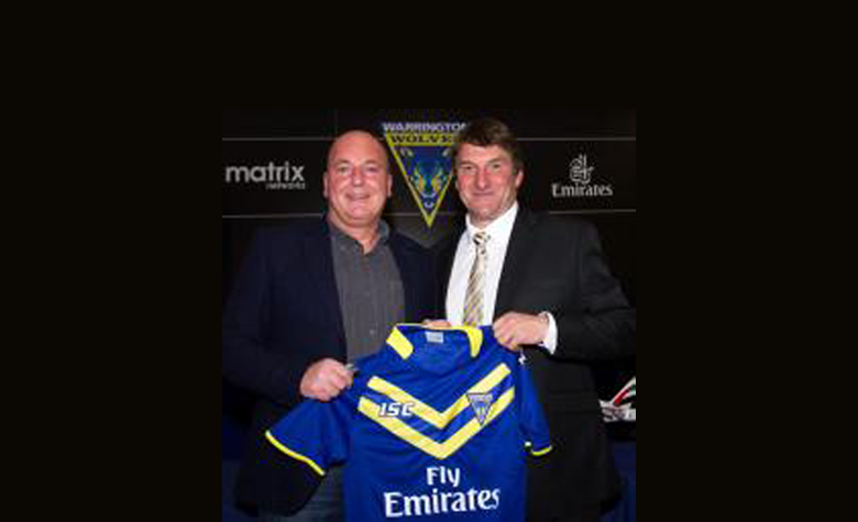 Mark Thomas Cortech Director is presented with the new 2014 Wolves home shirt by Warrington Wolves