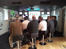 men watching presentation